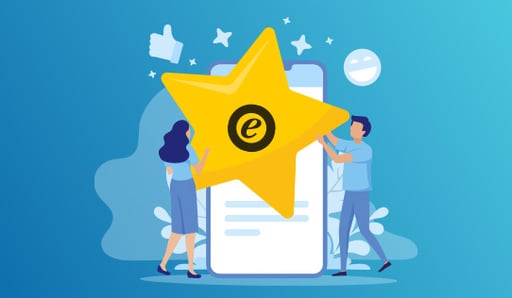 2 people carrying a giant trusted shops star