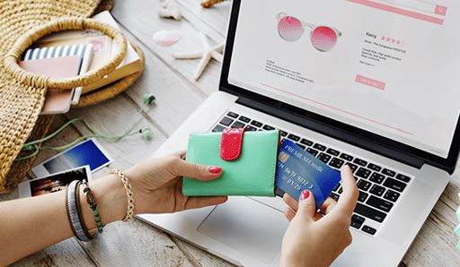 woman on product page pulling out a credit card from her wallet