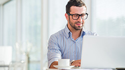man working hard on his laptop